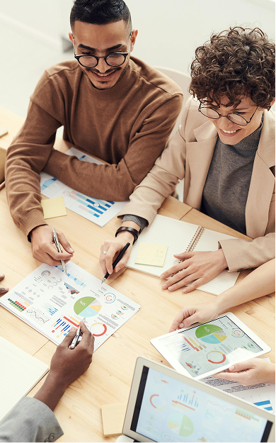 Intern developers collaborating on Odoo projects in a supportive team environment