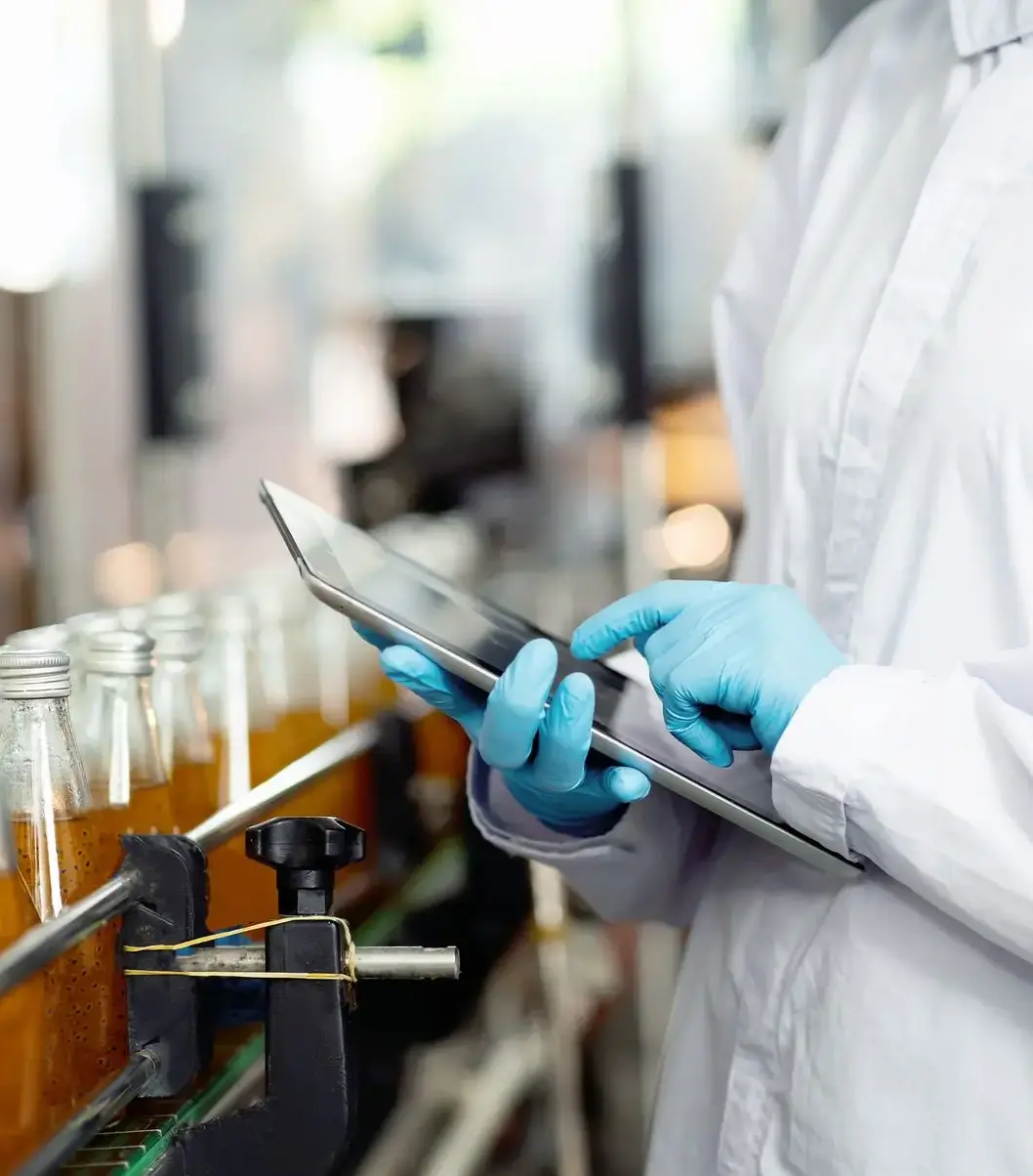 An employee uses a tablet to access management tools and work efficiently.
